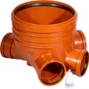 An orange plastic sewage pipe fitting with multiple inlets and outlets, along with a small bottle of lubricant, is shown against a white background. Produktbild-Vorschau