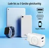 A white charging station is shown with a tablet, smartphone, and smartwatch, illustrating its multi-device charging capability. Produktbild-Vorschau