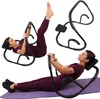 A woman is shown using an abdominal trainer in different positions. The trainer is black and the woman is wearing a purple outfit. Produktbild-Vorschau