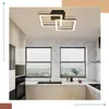 A modern kitchen with a sleek ceiling light. Produktbild-Vorschau