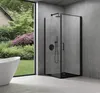 A modern bathroom with a shower cabin and a bathtub, overlooking a lush garden. Produktbild-Vorschau