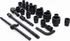 A collection of black metal socket wrenches and extensions on a white background. Produktbild-Vorschau