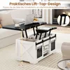 A lift-top coffee table in a living room setting, with the top raised to demonstrate its function. Voir les images du produit