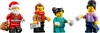 Four LEGO minifigures are shown against a white background. From left to right: Santa Claus holding a sack, a man with a red scarf holding a letter, a woman in teal holding a cookie, and a woman in purple holding two mugs. Podgląd zdjęcia produktu