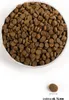 A bowl filled with dog food kibble, with a single piece shown separately with a size indicator. Náhľad obrázku produktu