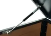 Close-up of a gas strut attached to the lid of a storage box. Anteprima dell’immagine prodotto