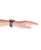 A person's wrist wearing a watch against a white background. Produktbild-Vorschau