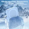 A white wireless charger is shown emerging from ice, with snowy mountains in the background. Produktbild-Vorschau