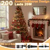 A decorated Christmas tree and fireplace in a living room. Produktbild-Vorschau