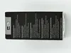 The image shows the side of a product box with text and a logo. Produktbild-Vorschau