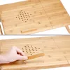 Close-up view of a wooden laptop table with ventilation holes and an adjustable stopper. One image shows the table from above, the other shows a hand interacting with the stopper. Produktbild-Vorschau