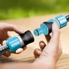 Hands connecting two parts of a garden hose. Náhľad obrázku produktu