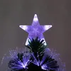 The top of a Christmas tree with a star topper and fiber optic lights. Produktbild-Vorschau