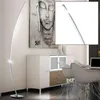 A modern living room with a floor lamp, a cabinet, and chairs. Náhled obrázku produktu