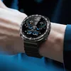 A person's wrist wearing a smartwatch with a diamond-studded bezel and a black strap. The watch face displays time, date, and other health metrics. Produktbild-Vorschau