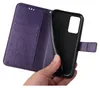 A hand holding a purple floral flip phone case open to show the inside. Produktbild-Vorschau