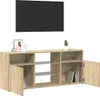 A TV stand with open shelves and cabinets, displayed in a studio setting. Náhľad obrázku produktu