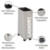 A taupe laundry basket with the word "LAUNDRY" printed on it, shown with callouts highlighting its features. Anteprima dell’immagine prodotto