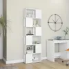 A white bookshelf filled with decorative items and books, placed in a room with a desk and a clock on the wall. Náhľad obrázku produktu