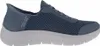 A side view of a blue Skechers slip-on shoe against a white background. Produktbild-Vorschau