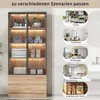 A tall display cabinet with glass doors and wooden drawers, shown with various interior design scenes around it. Voir les images du produit