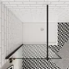 A top-down view of a modern shower enclosure with geometric patterned tiles. Produktbild-Vorschau