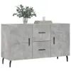 A concrete-effect sideboard with two doors and two drawers, decorated with a vase of flowers and books. Produktbild-Vorschau