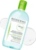 A bottle of Bioderma Sébium H2O Purifying Cleansing Micelle Solution is shown against a white background with two clear liquid droplets. Anteprima dell’immagine prodotto