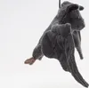 A plush toy bat hanging against a white background. Produktbild-Vorschau