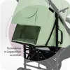 Close-up view of a green baby stroller, highlighting its adjustable backrest feature. Náhled obrázku produktu