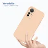 A hand holding a pink phone case against a white background. Produktbild-Vorschau