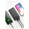 A black power bank is shown charging two smartphones, with one displaying a charging percentage. Produktbild-Vorschau