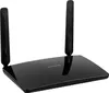 A black TP-Link router with two antennas, shown from a diagonal front view on a white background. Podgląd zdjęcia produktu