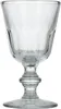 A clear glass wine glass with a fluted bowl and a decorative stem, presented on a white background. Podgląd zdjęcia produktu