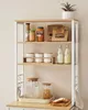 A clean kitchen shelving unit filled with various kitchen items like jars, bottles, bowls, and glassware. Náhled obrázku produktu