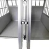 Close-up view of the interior of two connected dog crates, showing the aluminum frame and the interior surfaces. Voir les images du produit