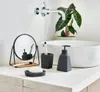 A bathroom countertop with various accessories. Podgląd zdjęcia produktu