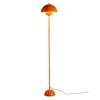 A floor lamp with an orange dome-shaped shade and a thin orange stem, standing against a white background. Podgląd zdjęcia produktu