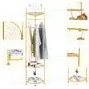 A collage of images showing a gold metal corner coat rack with shelves and hanging clothes, along with close-up details of its construction and accessories. Podgląd zdjęcia produktu