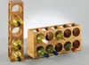 Two wooden wine racks filled with bottles of wine are placed on a plain gray surface with a light gray background. Náhľad obrázku produktu