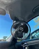 A car interior with a fan attached to the ceiling. Anteprima dell’immagine prodotto