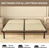 A bed frame with wooden slats is shown in a room setting. Voir les images du produit