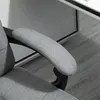 A close-up view of the armrest of a gray office chair. Náhled obrázku produktu