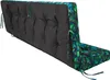 A tufted cushion with a tropical leaf pattern on the sides and ties. Voir les images du produit