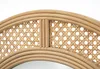 A close-up view of the rattan frame of a mirror. Podgląd zdjęcia produktu