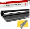 A roll of dark solar window film is shown with its packaging and a squeegee tool. Anteprima dell’immagine prodotto