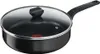 A black frying pan with a glass lid and a black handle, shown from a slightly elevated side angle against a white background. Voir les images du produit