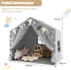A children's play tent decorated with lights and flags, with stuffed toys inside. Voir les images du produit