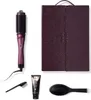 A collection of hair styling tools and accessories laid out on a white background. Produktbild-Vorschau