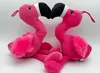 Two pink plush flamingo toys are positioned facing each other with their necks curved, appearing to be kissing. Produktbild-Vorschau